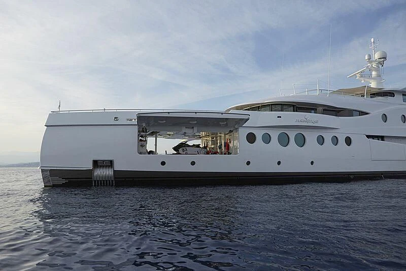 a large white ship in the water aboard MADAME KATE Yacht for Sale