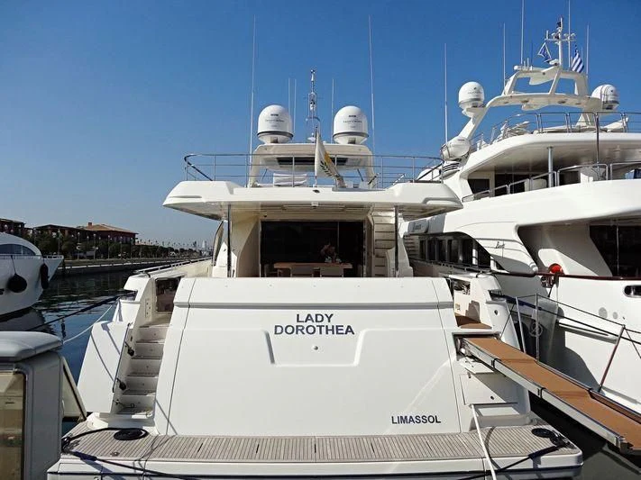a boat docked at a pier aboard LADY DOROTHEA Yacht for Sale