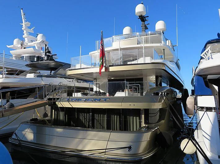 a large boat docked aboard TRIDENT Yacht for Sale