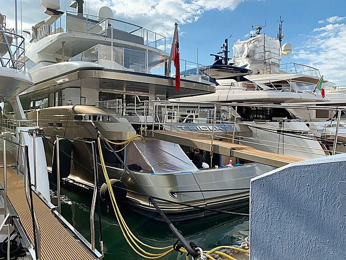 a boat docked at a pier aboard TRIDENT Yacht for Sale