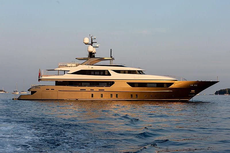 a large boat in the water aboard TRIDENT Yacht for Sale