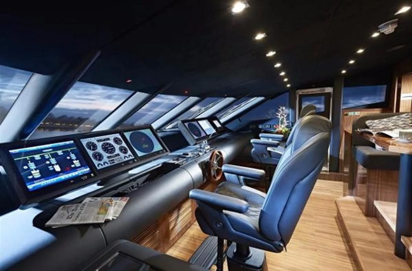 a room with computers and monitors aboard ZOZO Yacht for Sale