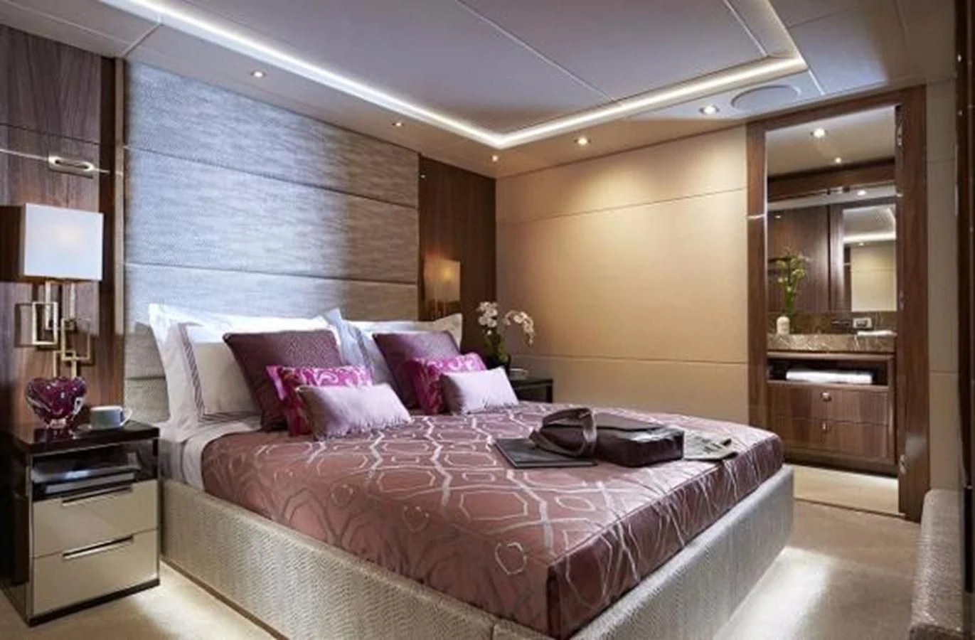 a large bed in a hotel room aboard ZOZO Yacht for Sale