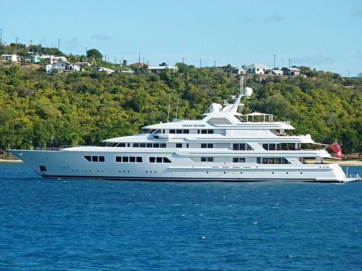a large white boat on the water aboard EBONY SHINE Yacht for Sale