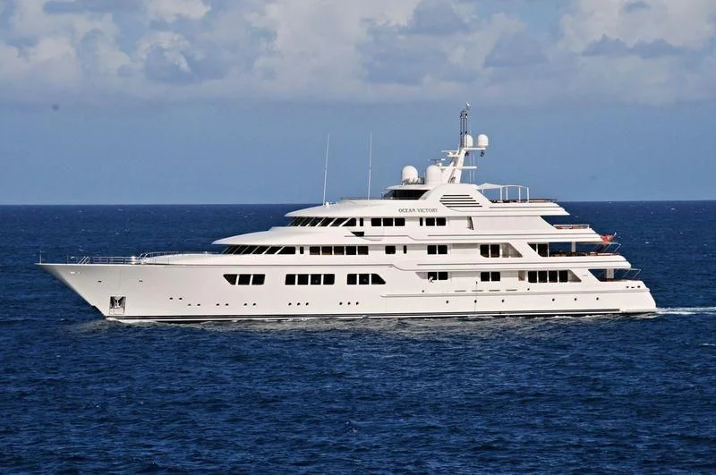 a white yacht in the water aboard EBONY SHINE Yacht for Sale