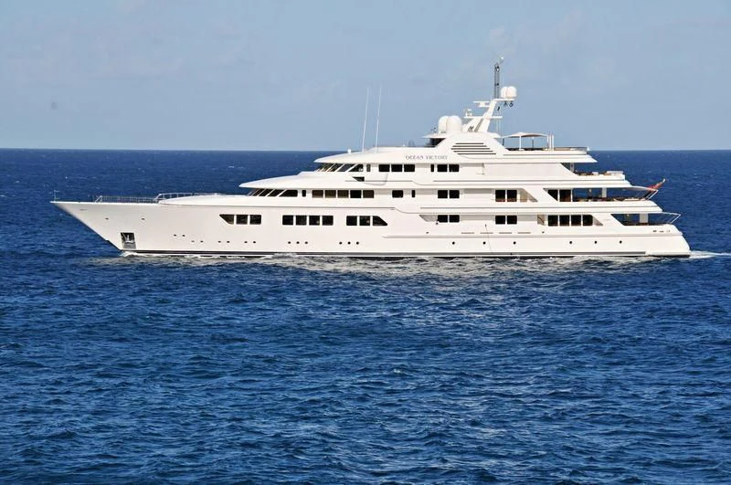 a white boat in the water aboard EBONY SHINE Yacht for Sale