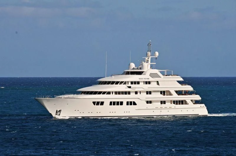 a white yacht in the water aboard EBONY SHINE Yacht for Sale