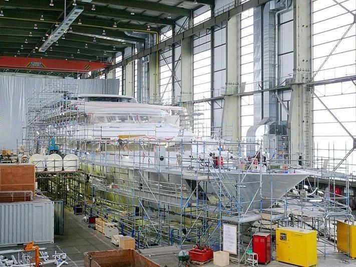 a large factory with many machines aboard EBONY SHINE Yacht for Sale