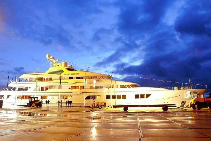 a large cruise ship in a harbor aboard EBONY SHINE Yacht for Sale