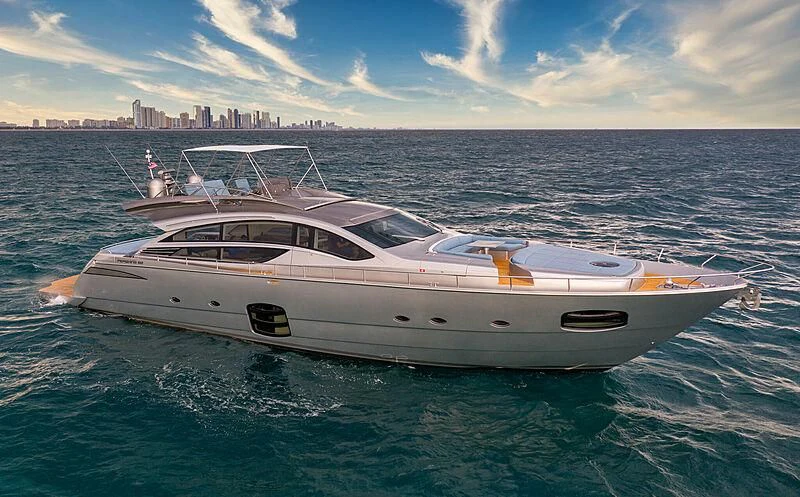 a white yacht in the water aboard UPTOWN GIRL Yacht for Sale