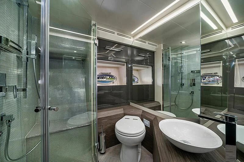 a bathroom with glass walls aboard UPTOWN GIRL Yacht for Sale