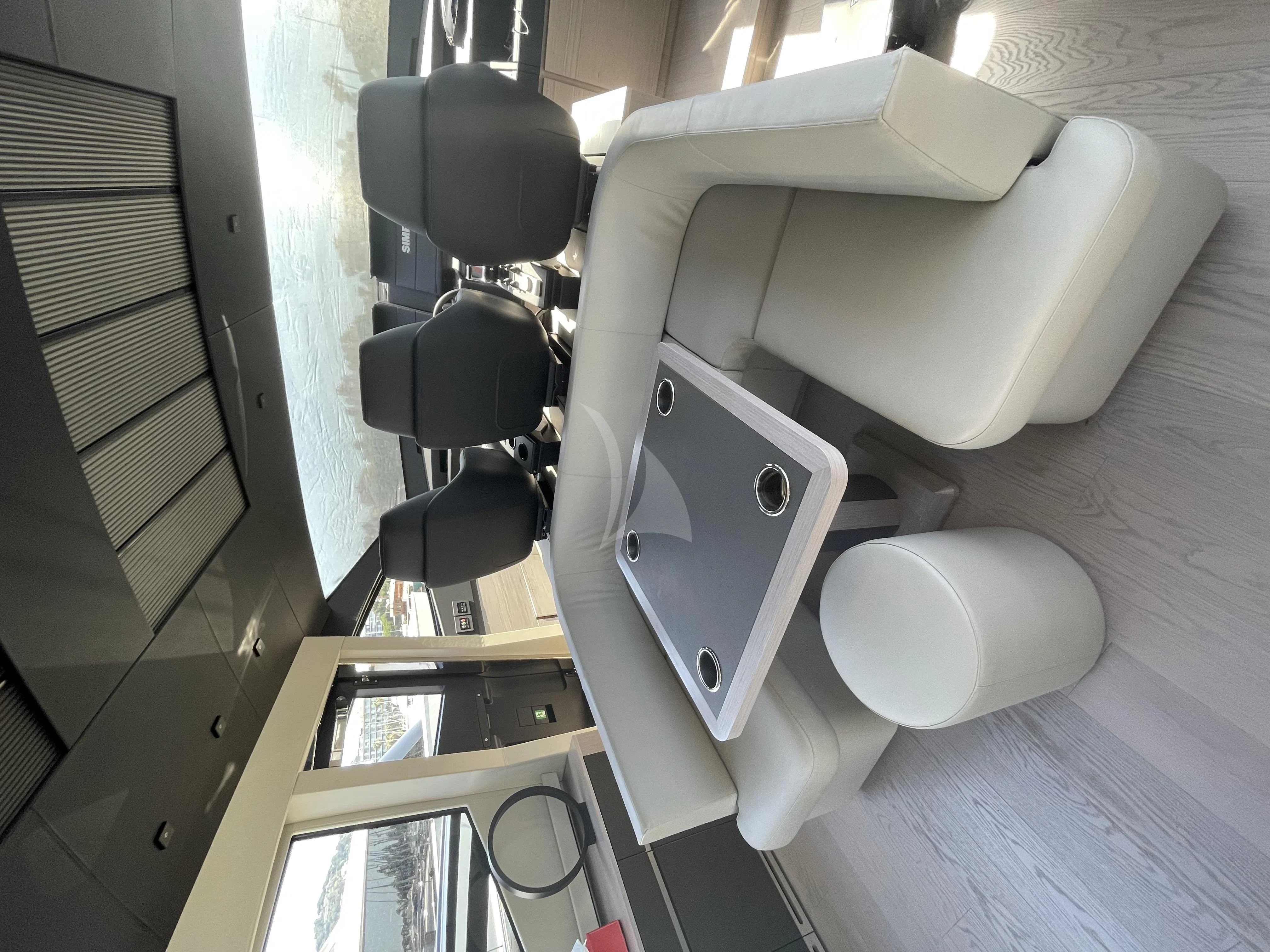 a white toilet in a room aboard SURVIVOR OF LONDON Yacht for Sale