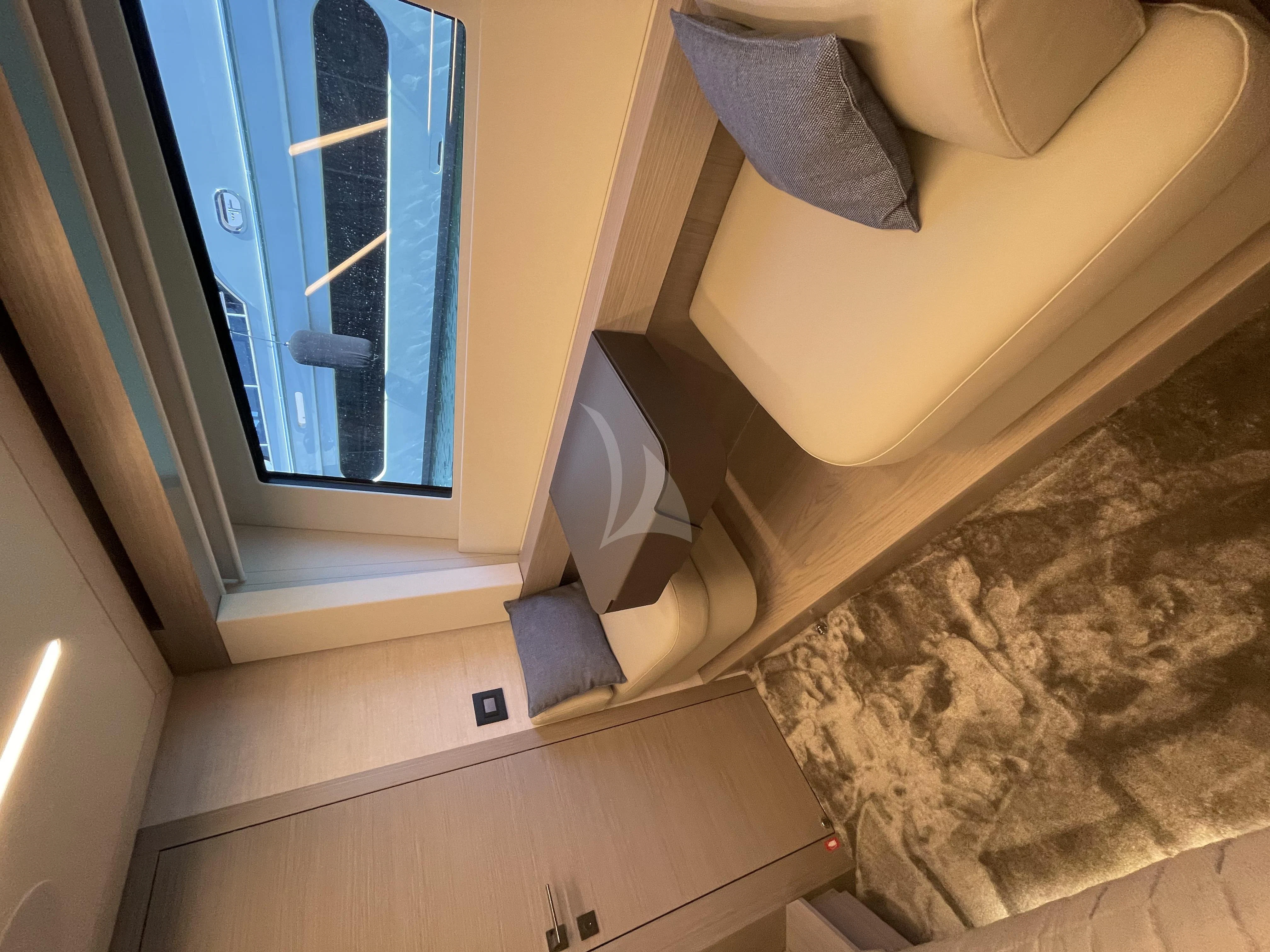 a bathroom with a large mirror aboard SURVIVOR OF LONDON Yacht for Sale