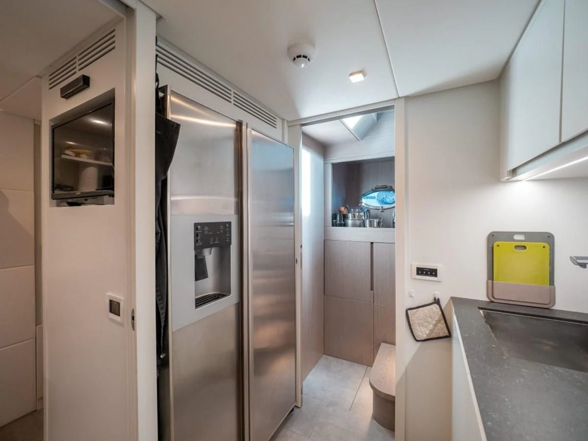 a room with a glass door aboard SURVIVOR OF LONDON Yacht for Sale
