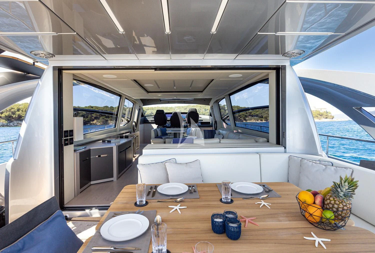 a room with a table and chairs aboard SURVIVOR OF LONDON Yacht for Sale