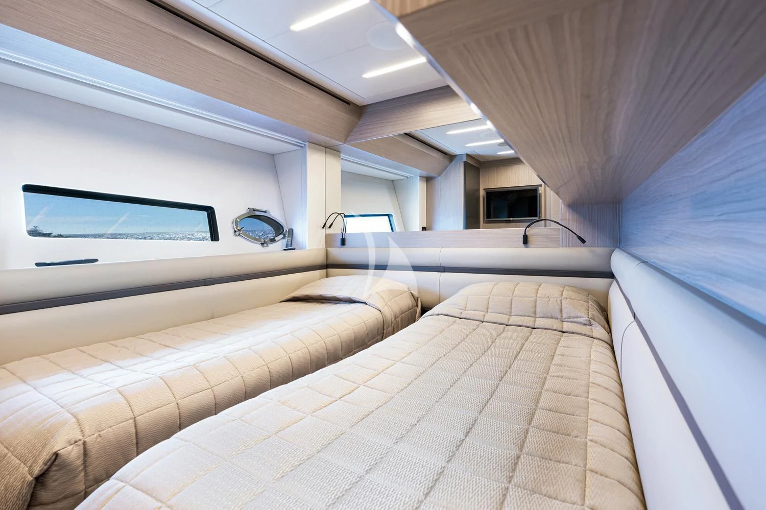 a room with a bed and a window aboard SURVIVOR OF LONDON Yacht for Sale