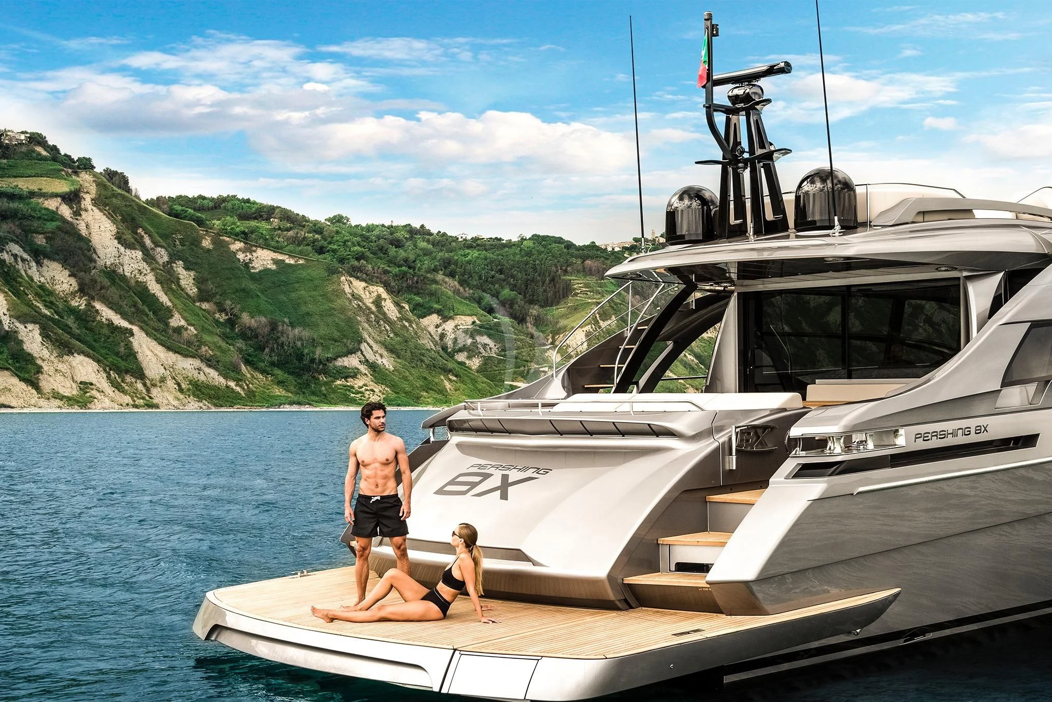 a man and a woman on a boat in the water aboard SURVIVOR OF LONDON Yacht for Sale