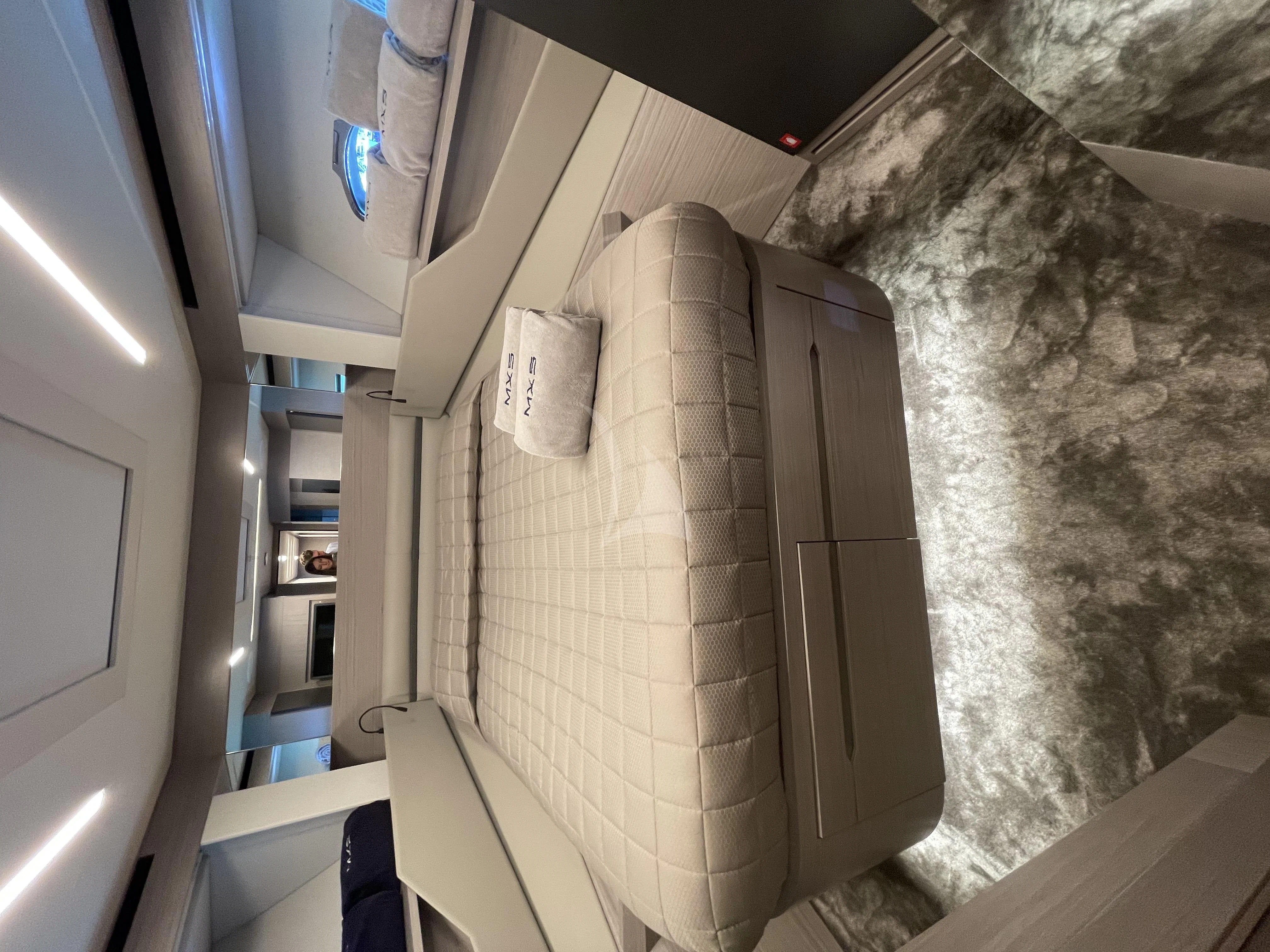 a room with a wall and a door with a hole in it aboard SURVIVOR OF LONDON Yacht for Sale