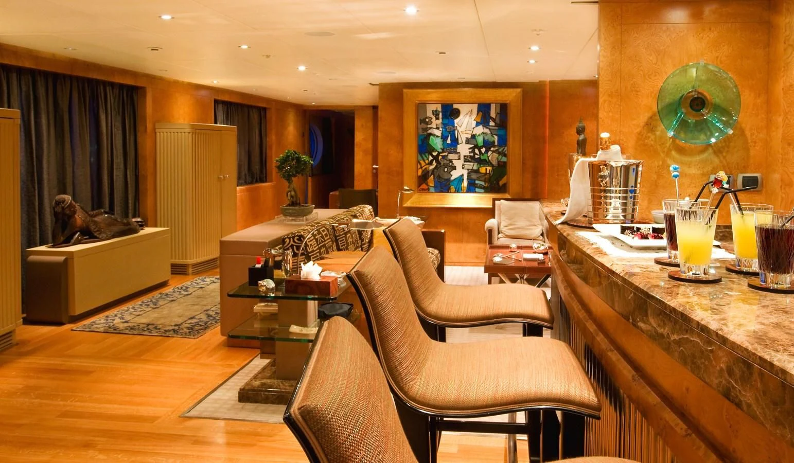 a living room with a large window aboard QUEEN AIDA Yacht for Sale