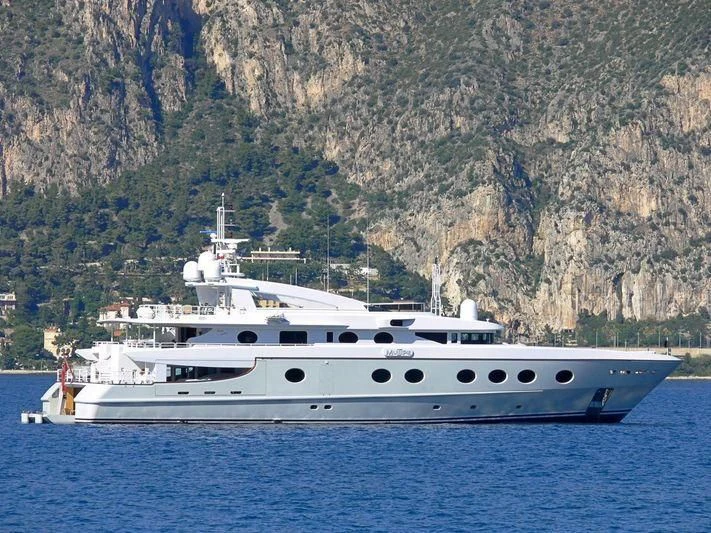 a white yacht in the water aboard QUEEN AIDA Yacht for Sale