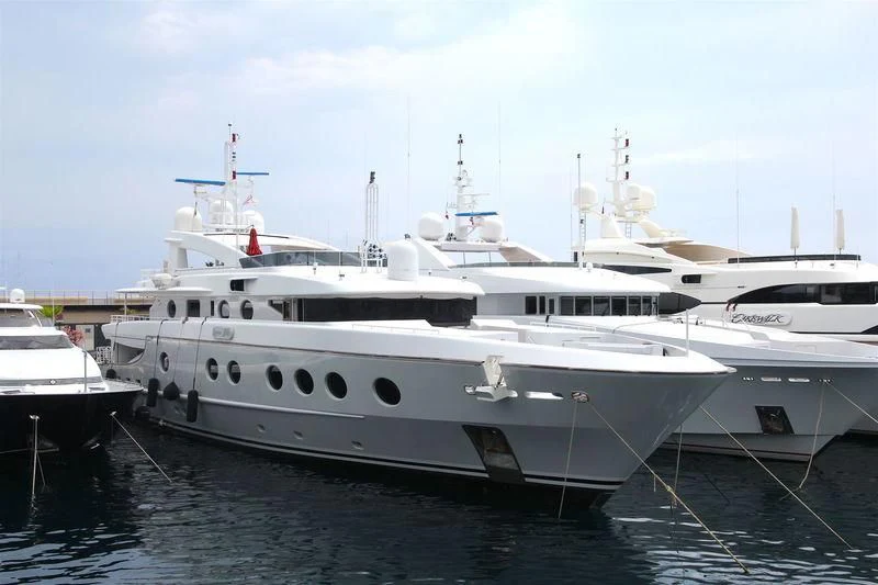 a few white yachts in the water aboard QUEEN AIDA Yacht for Sale