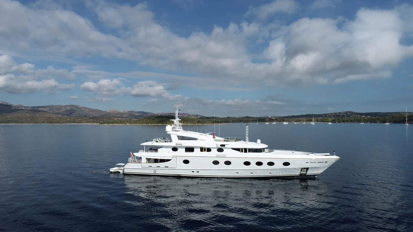 a white yacht in the water aboard QUEEN AIDA Yacht for Sale