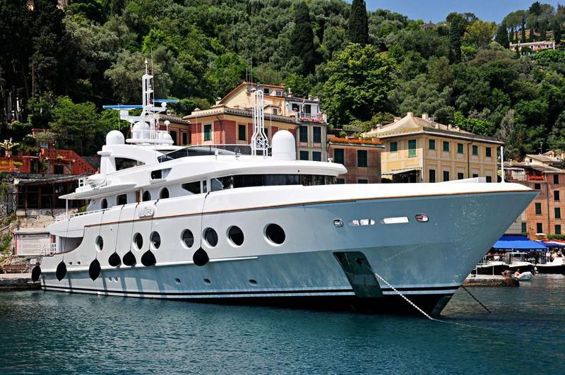 a large white boat in the water aboard QUEEN AIDA Yacht for Sale