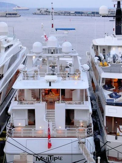 a large white building with a tower aboard QUEEN AIDA Yacht for Sale