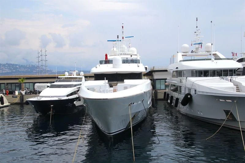 several boats in a harbor aboard QUEEN AIDA Yacht for Sale