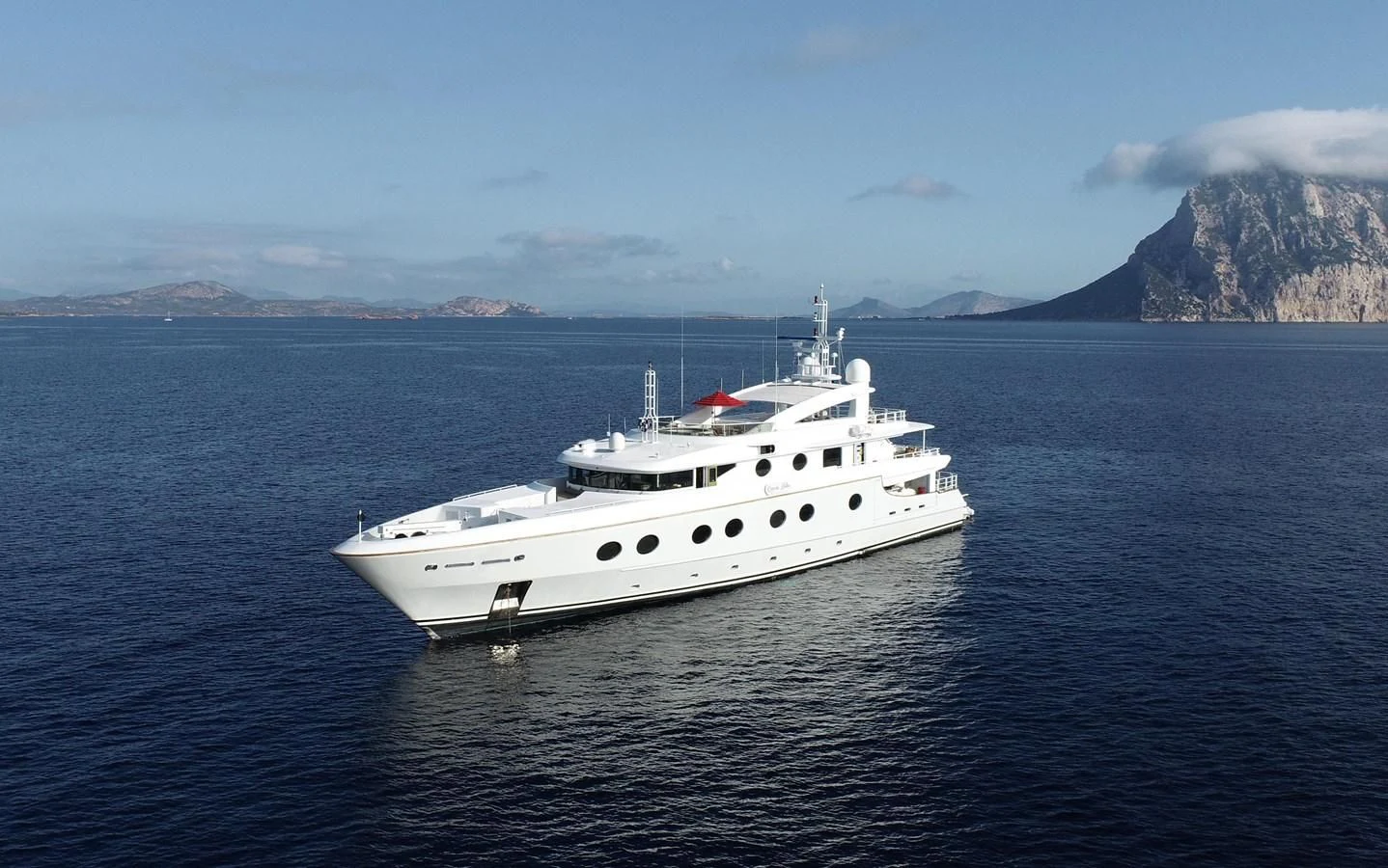 a white yacht in the water aboard QUEEN AIDA Yacht for Sale