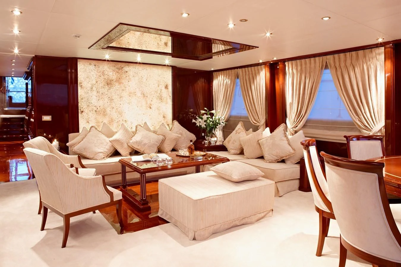 a living room with a couch and a coffee table aboard IRAKLIS L Yacht for Charter