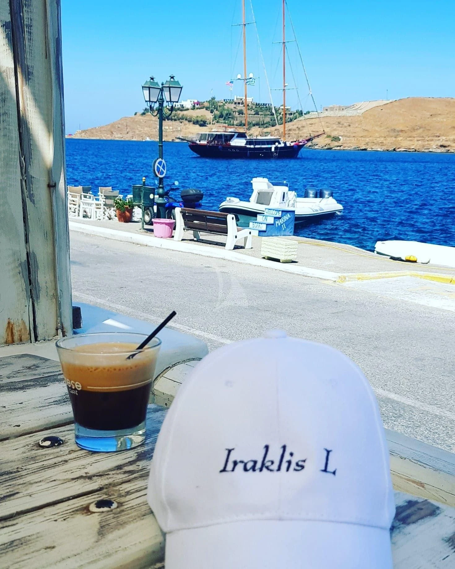 a cup of coffee on a table aboard IRAKLIS L Yacht for Charter