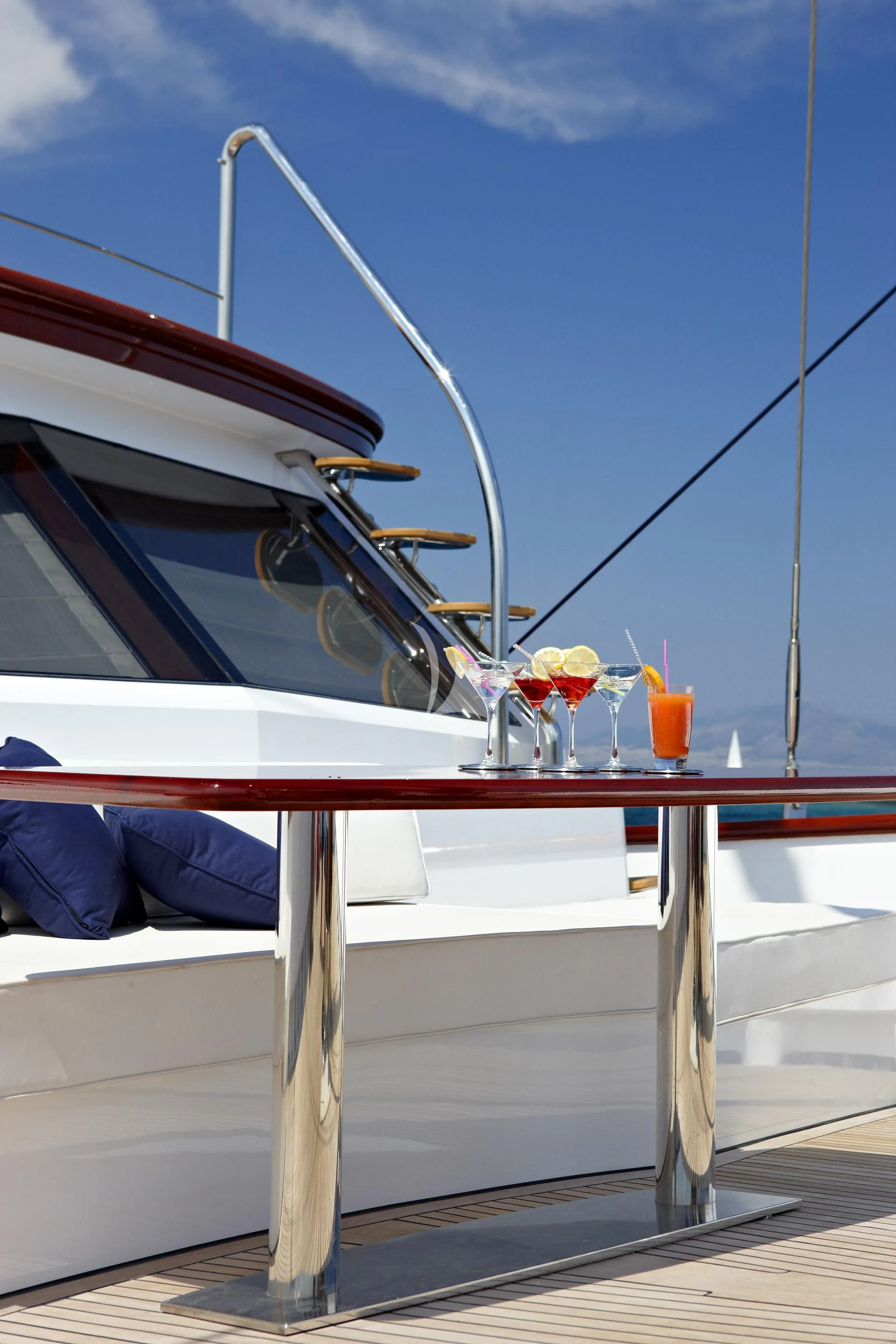 a boat with a table and chairs aboard IRAKLIS L Yacht for Charter