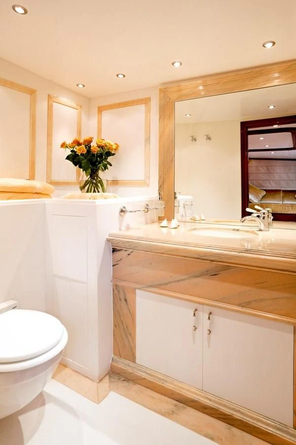 a bathroom with a sink and a toilet aboard IRAKLIS L Yacht for Charter