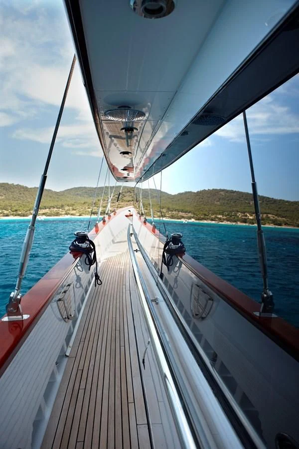a boat with a person on it aboard IRAKLIS L Yacht for Charter