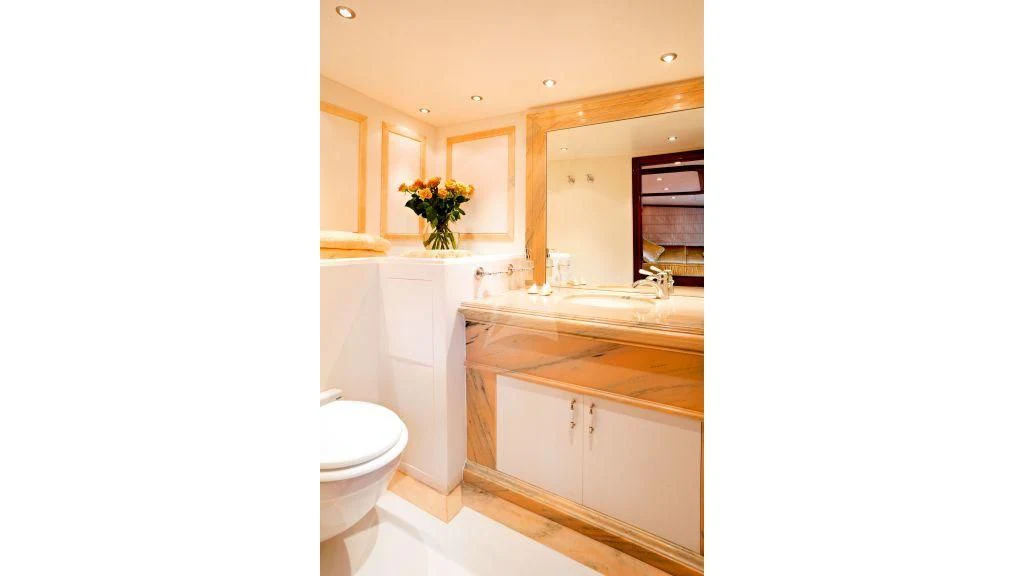 a bathroom with a sink and a toilet aboard IRAKLIS L Yacht for Charter