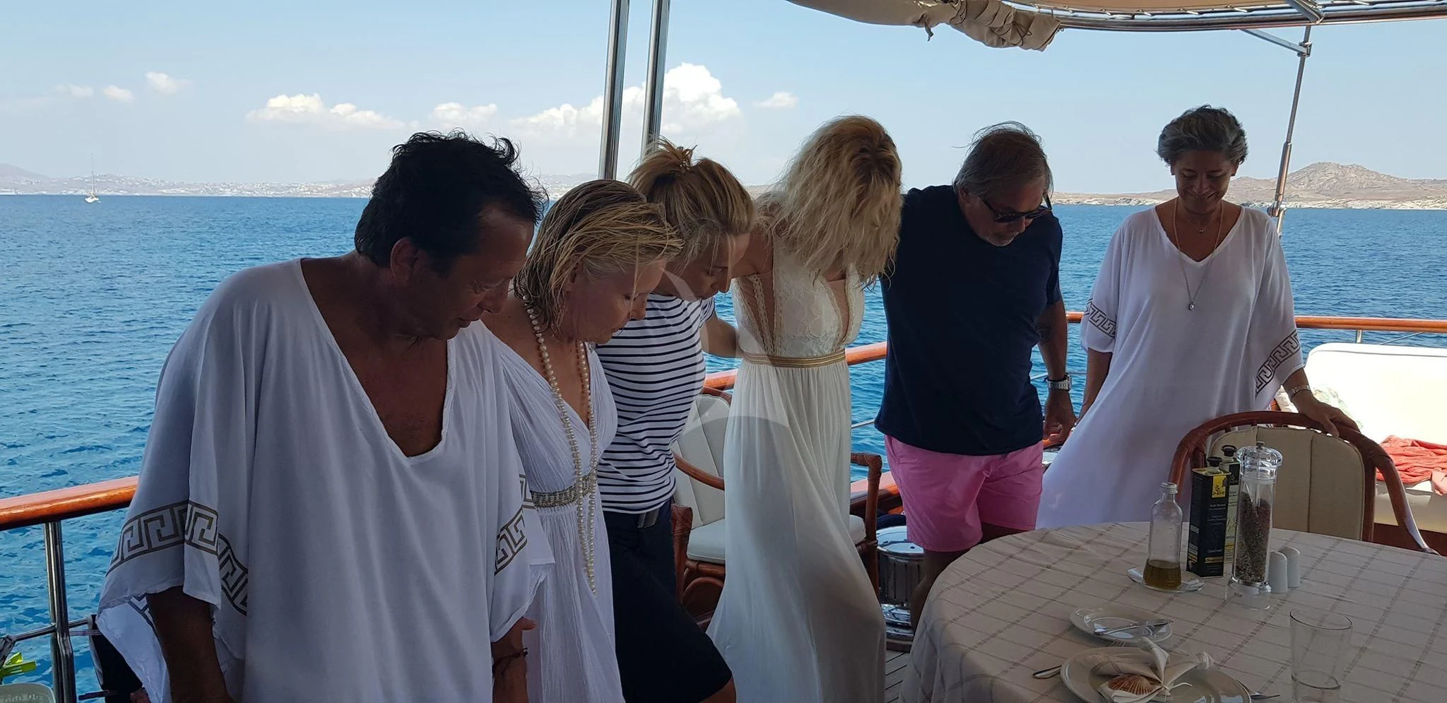 a group of people on a boat aboard IRAKLIS L Yacht for Charter