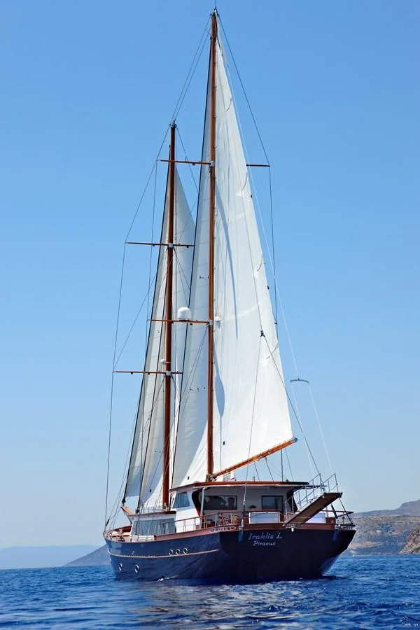 a boat sailing on the sea aboard IRAKLIS L Yacht for Charter