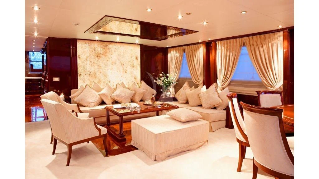 a living room with a fireplace aboard IRAKLIS L Yacht for Charter