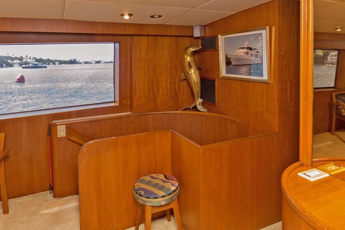 a room with a table and chairs aboard LADY CHARLOTTE Yacht for Sale