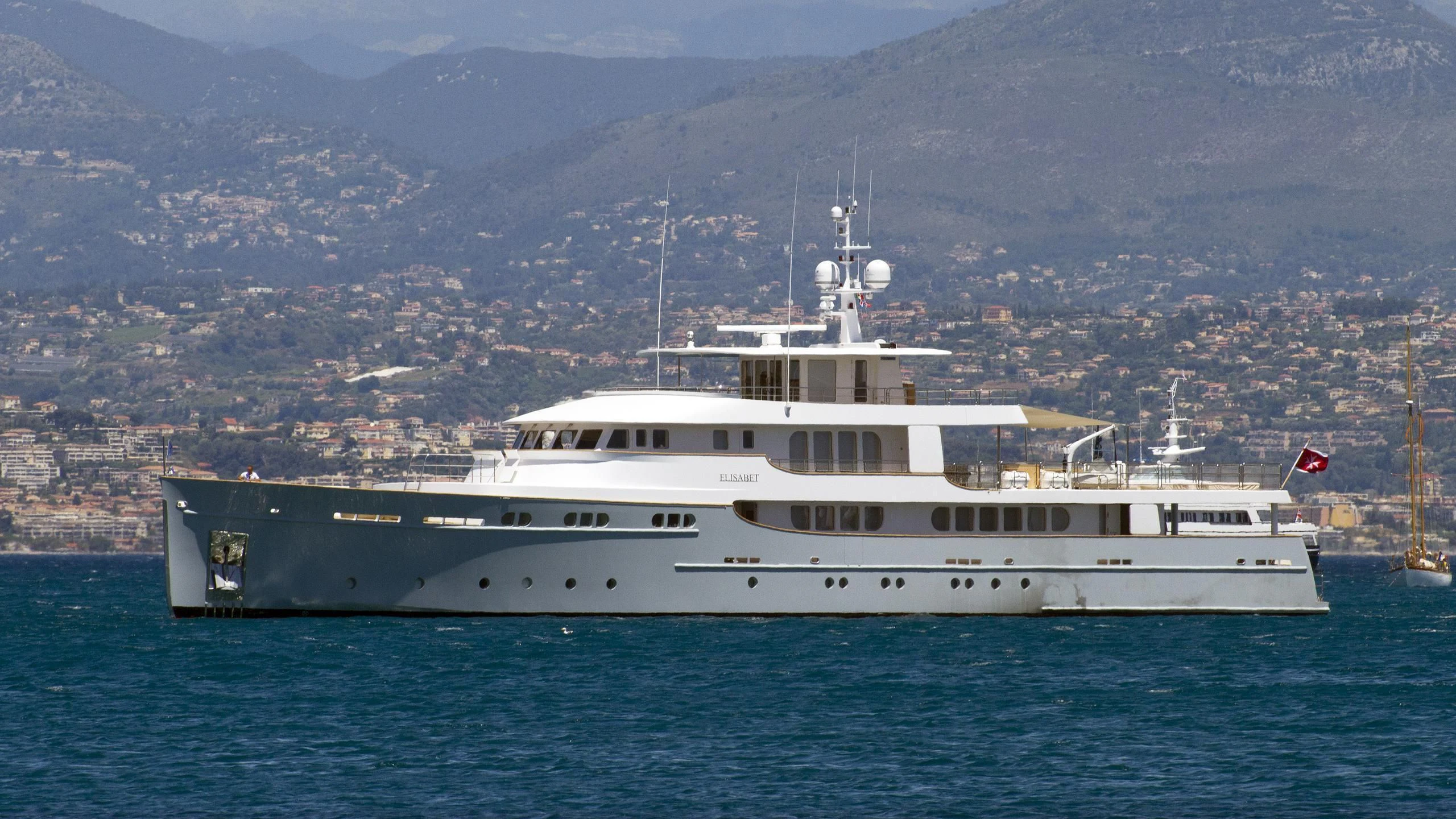 a large white ship in the water aboard ELISABET Yacht for Sale
