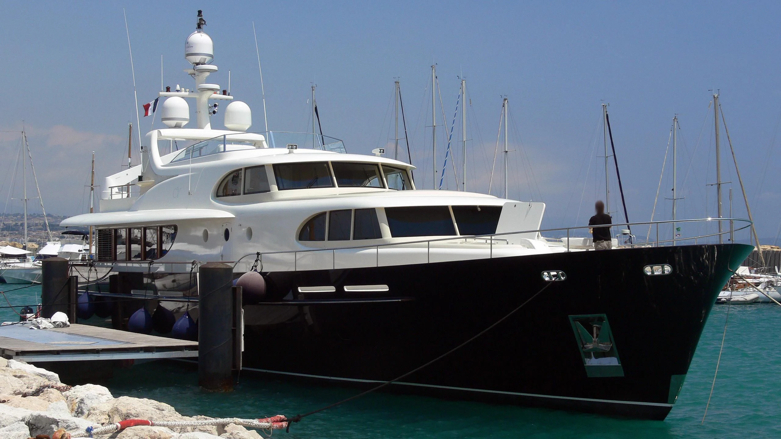 a boat docked at a pier aboard MAISHA Yacht for Sale