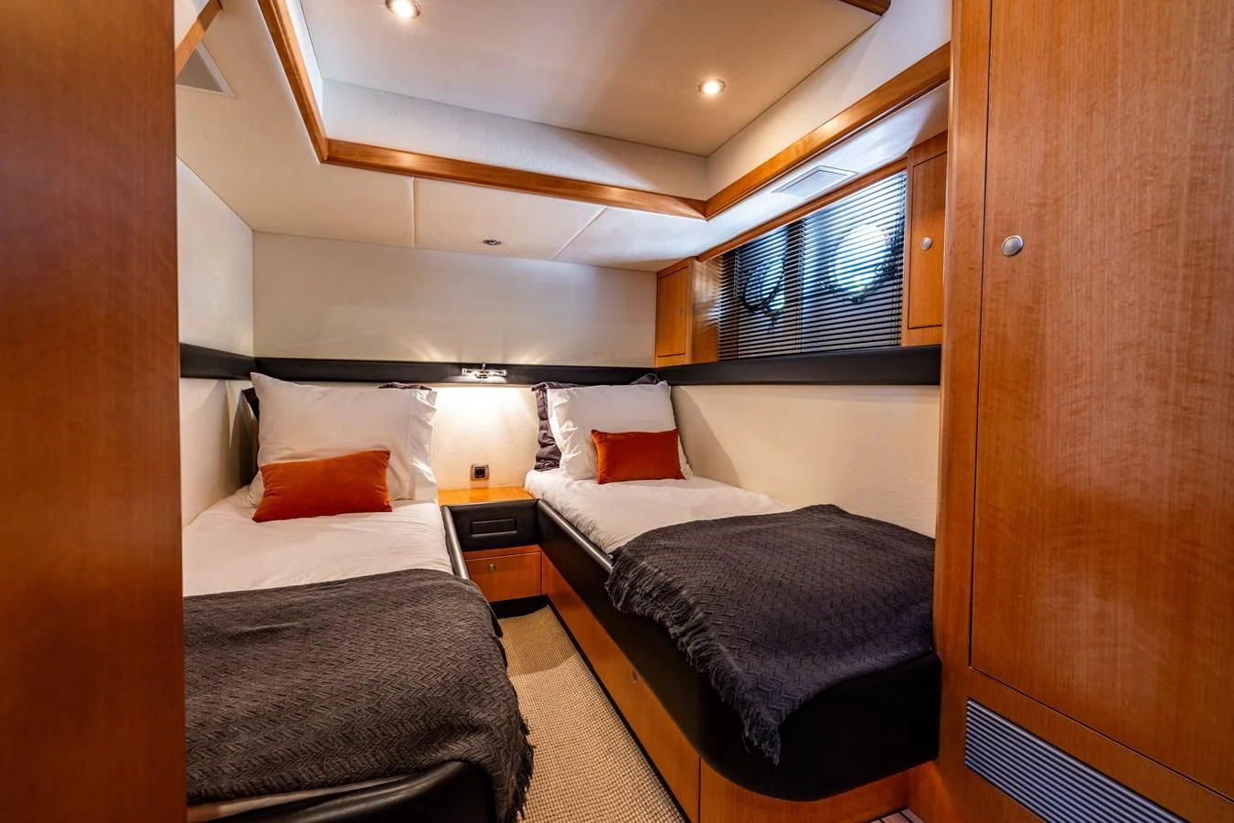 a room with two beds aboard OYSTER Yacht for Sale