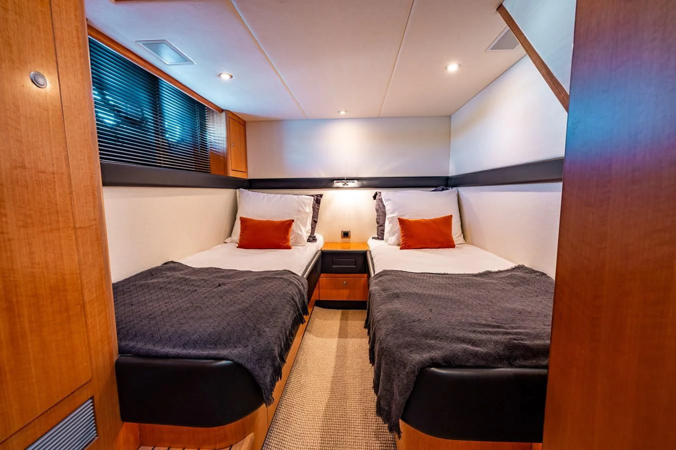 a room with a couple of beds aboard OYSTER Yacht for Sale