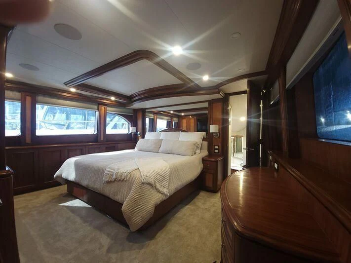 a bedroom with a large bed aboard SOUTHERN BREW Yacht for Sale