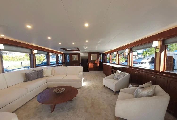 a living room with a couch and a table aboard SOUTHERN BREW Yacht for Sale