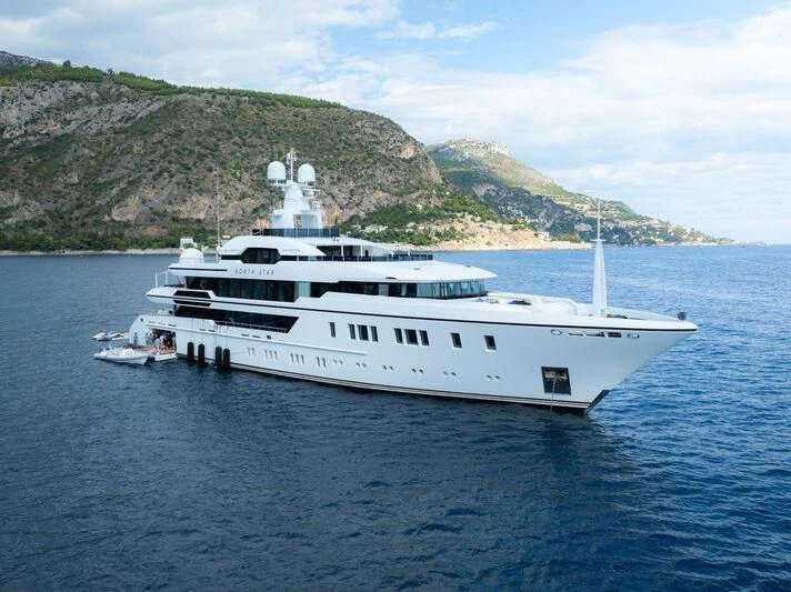 a large white boat in the water aboard NORTH STAR Yacht for Sale