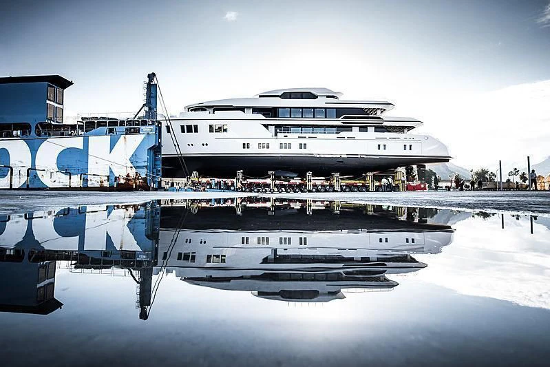 a large white boat docked at a pier aboard NORTH STAR Yacht for Sale
