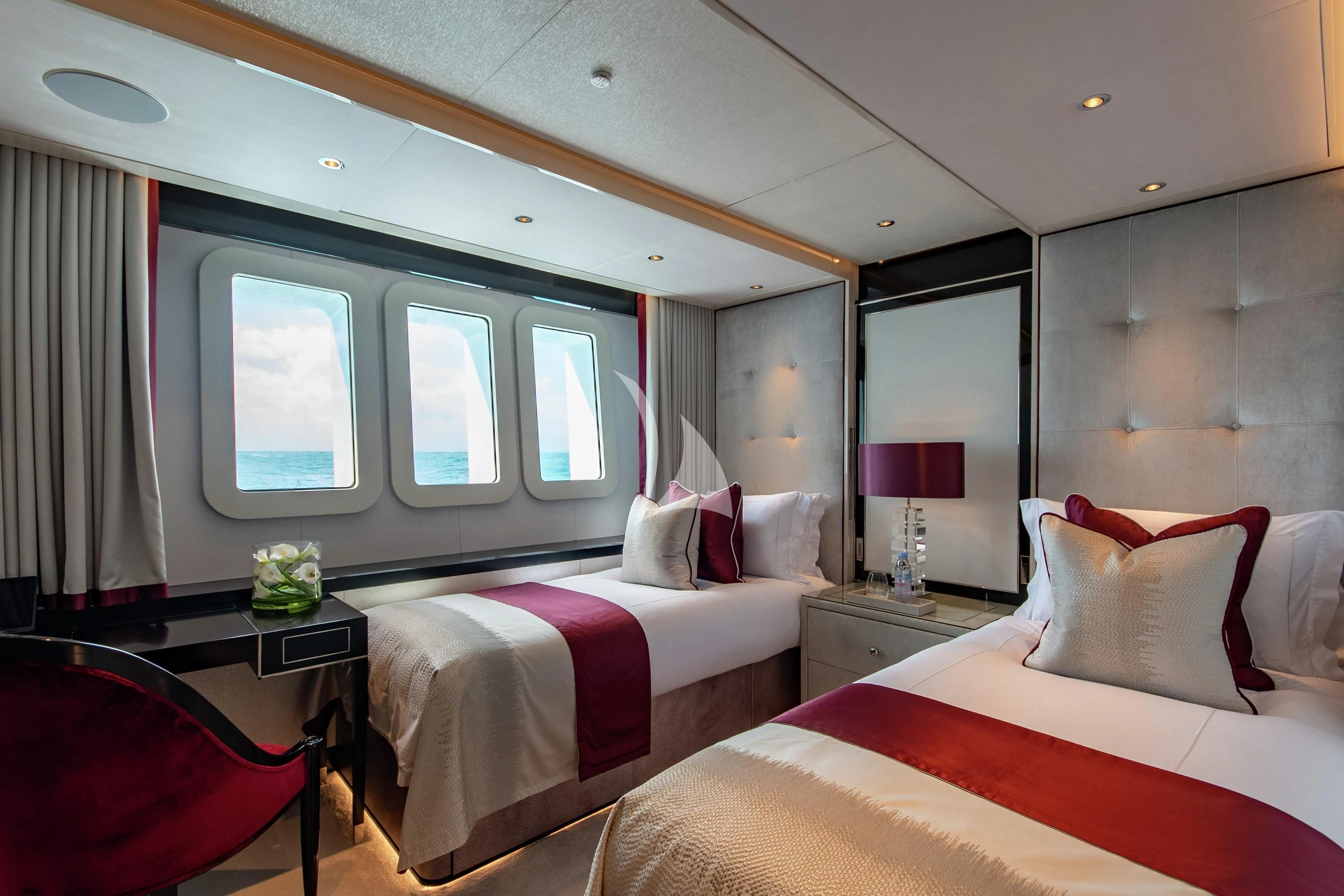 a room with two beds aboard NORTH STAR Yacht for Sale