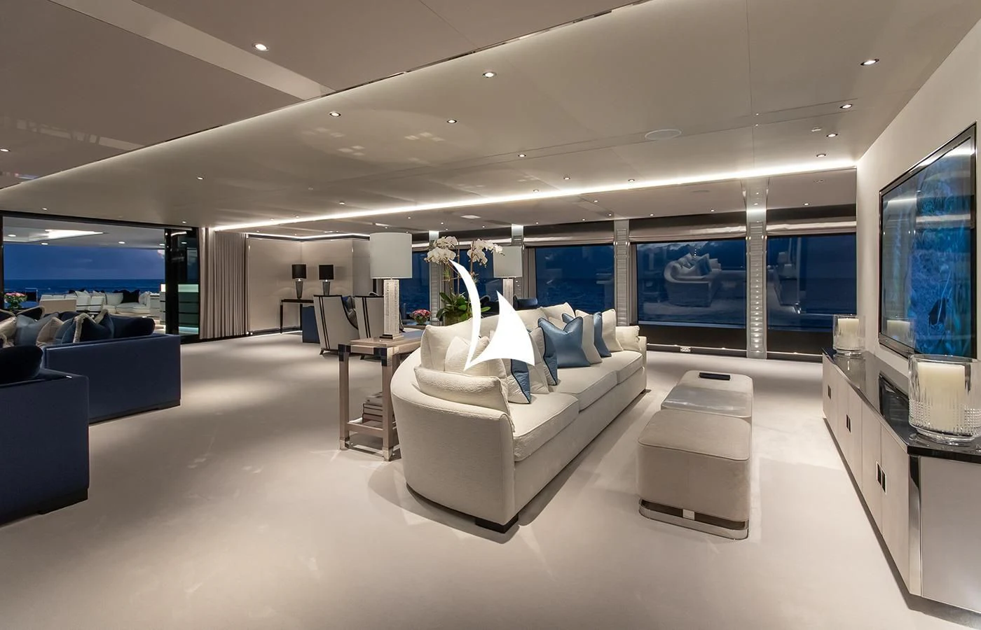 a room with a large white couch aboard NORTH STAR Yacht for Sale